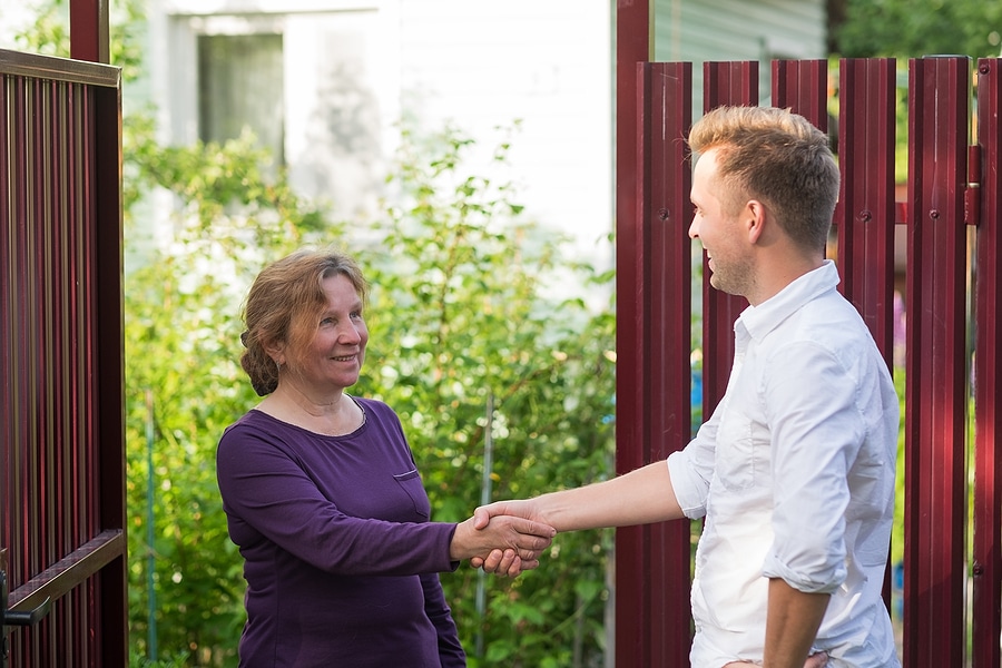 Fence Etiquette: What to Know & How to Talk to Neighbors